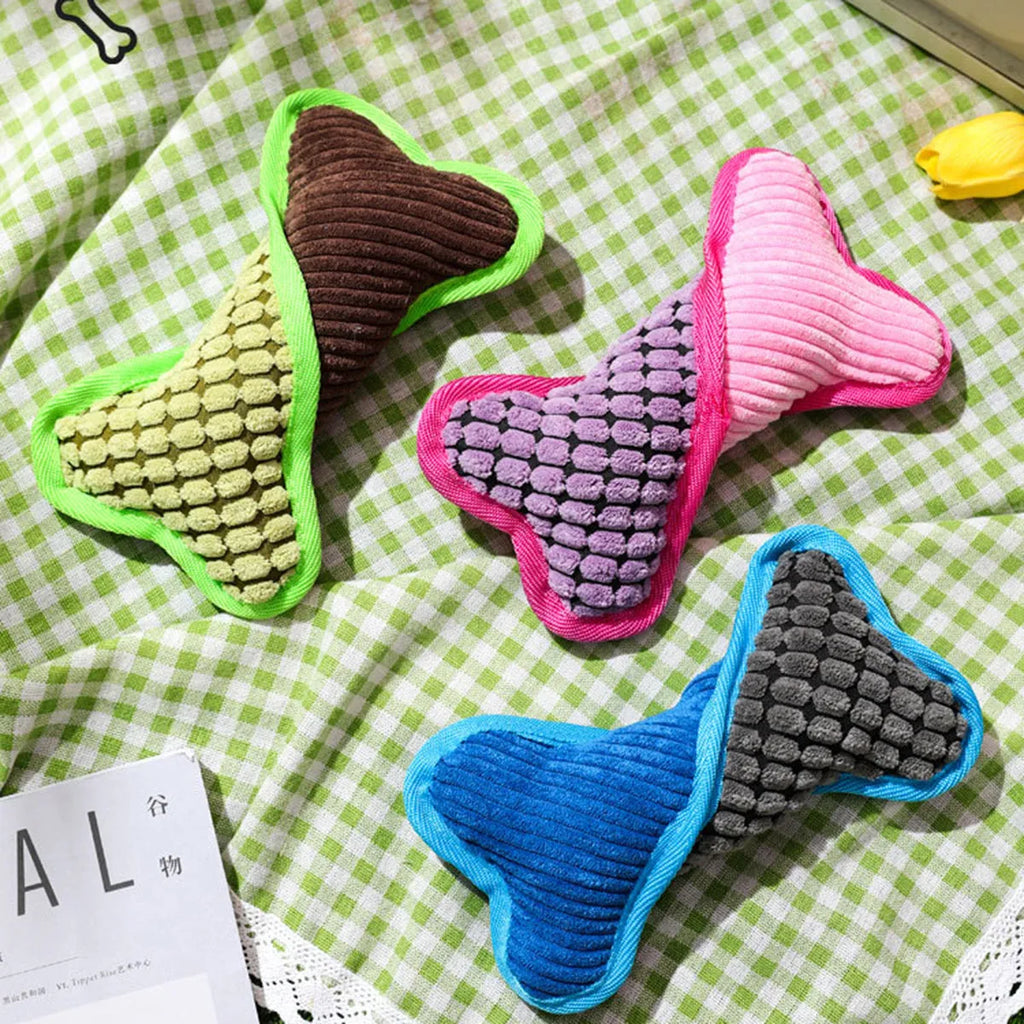 Blue teddy dog toy with rubber bone model and corn fleece lining for small to medium dogs
