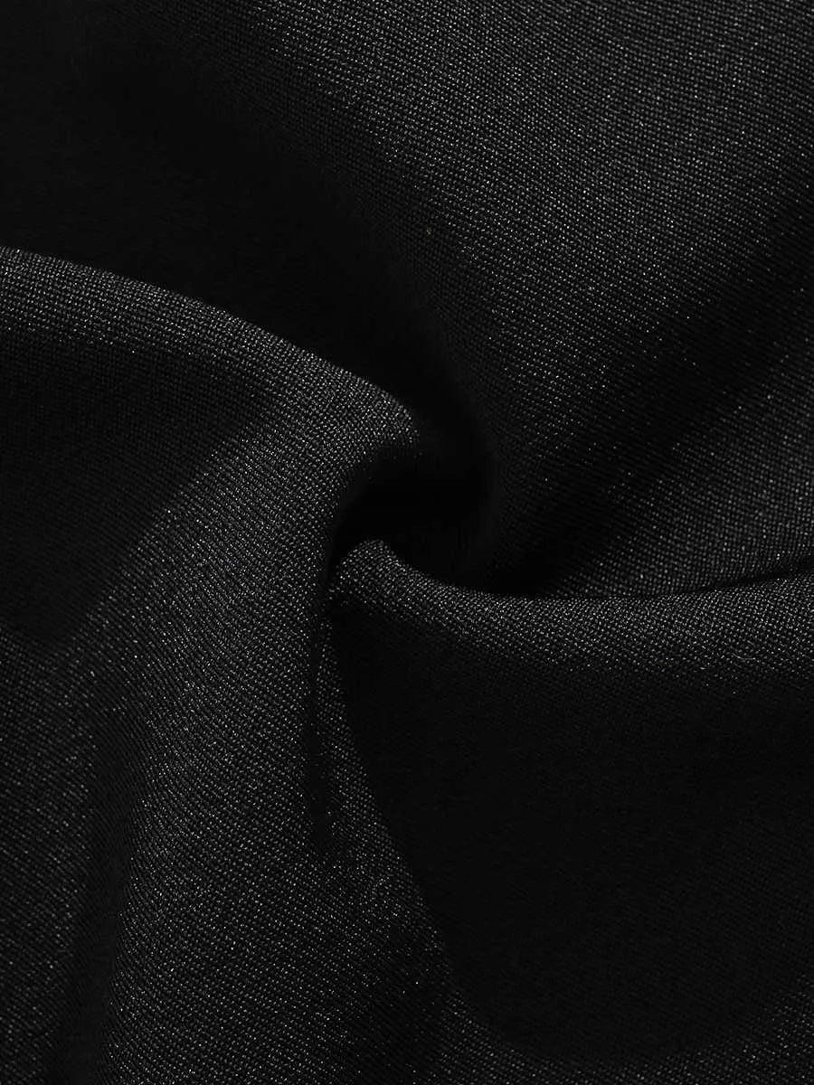 Black men's casual shorts with a button fly and semi-elastic waistband on a plain background.