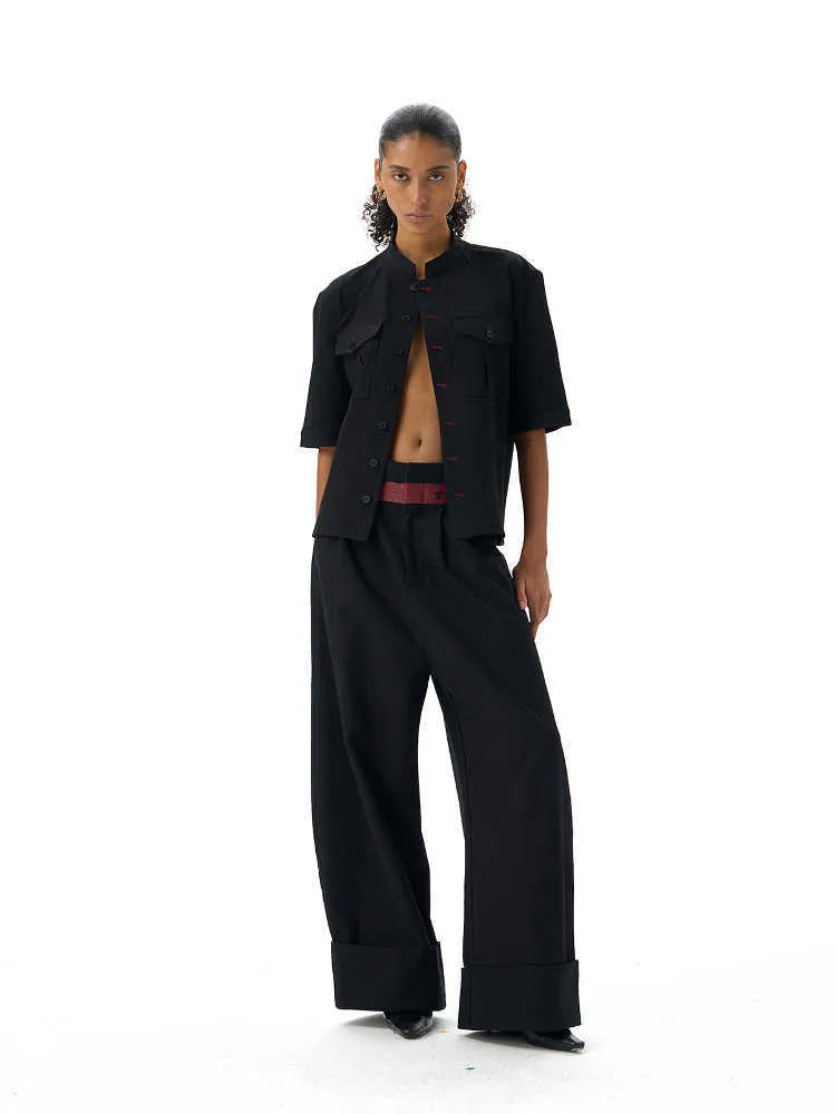 Black handmade loose fit half sleeve hunting shirt with a shirt collar.