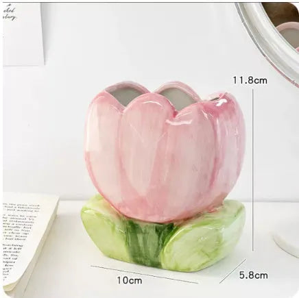 Ceramic desktop pen holder box with floral design in blue, pink, or purple.
