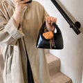 PU dumpling bag 20x9.5x20cm with sandwich pocket, available in black, brown, coffee, and red