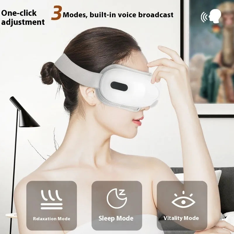 White rechargeable eye massager with airbag massage and hot compress functions