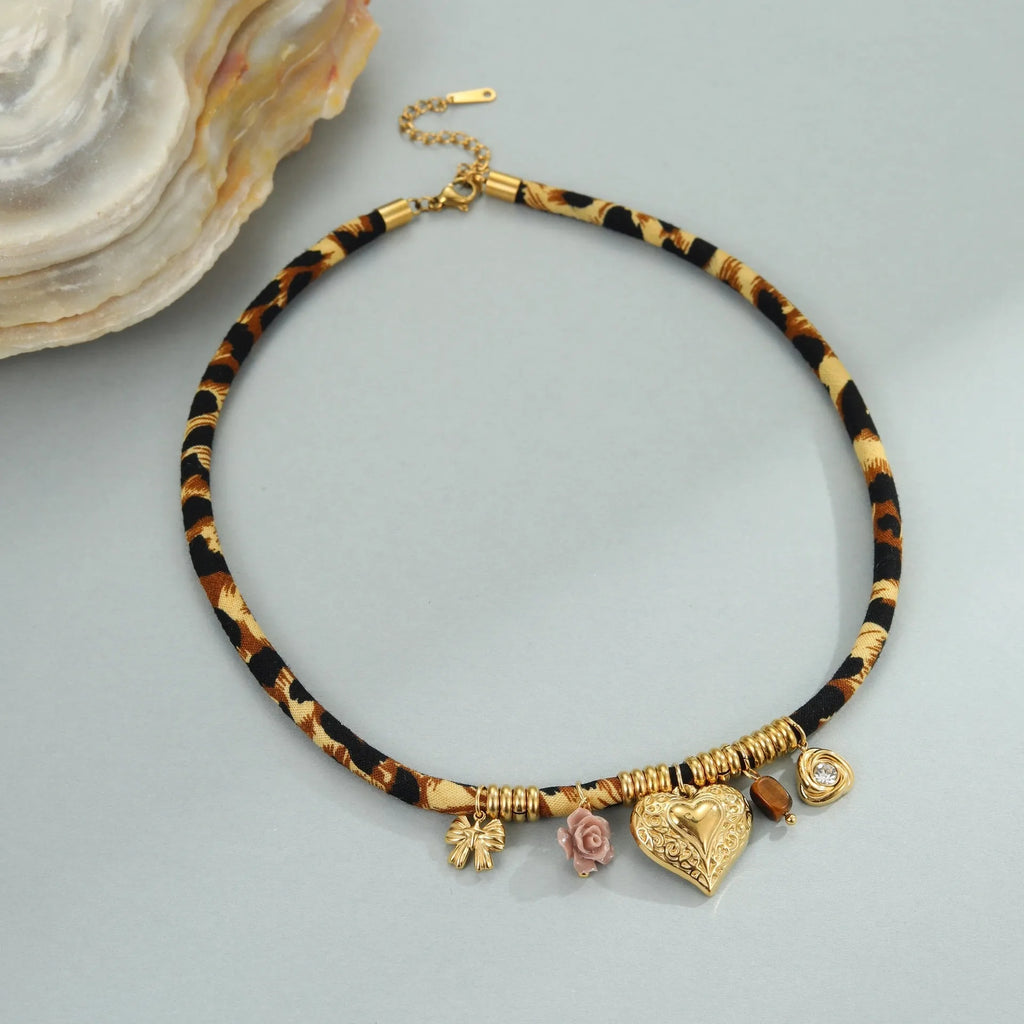 Geometric leopard pendant stainless steel necklace with gold-toned electroplated finish and adjustable chain
